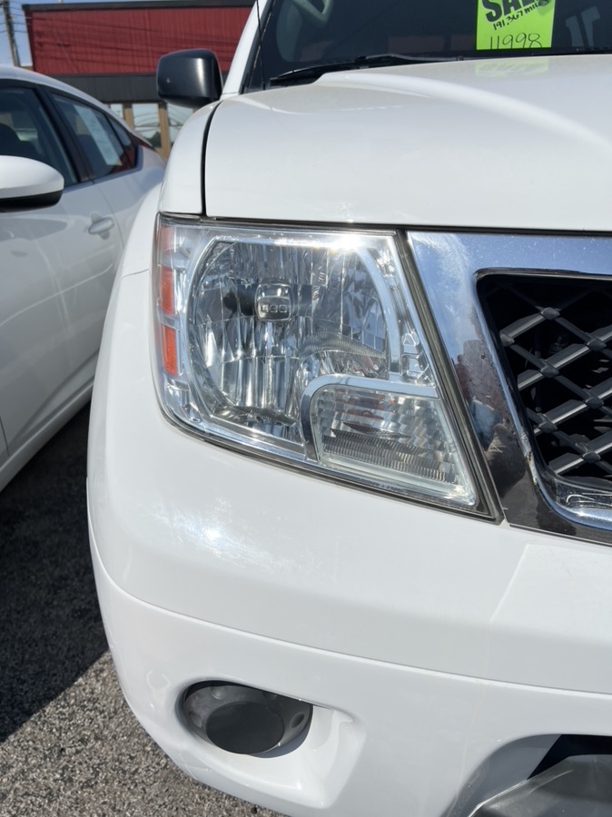 After Nissan Frontier headlight restoration — clear lens